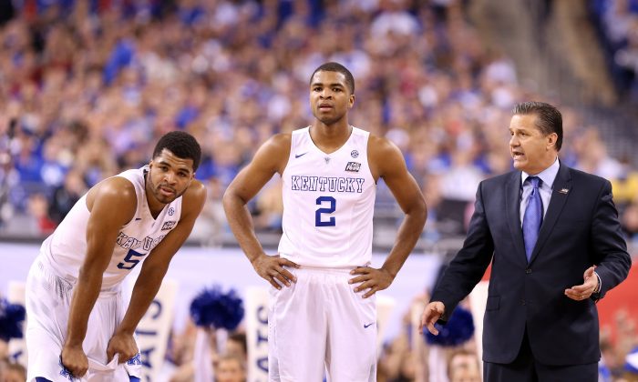 Andrew Harrison (L), Aaron Harrison (C) were two big parts of Kentucky head coach John Calipari's 10-man platoon system that helped the Wildcats all the way to the Final Four. (Streeter Lecka/Getty Images) 