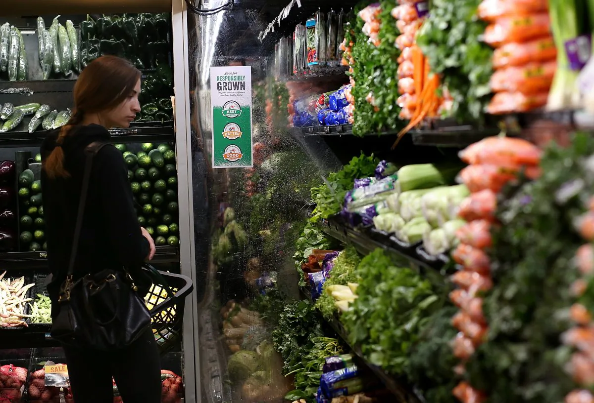 SAN FRANCISCO, CA - OCTOBER 15: A customer shops for produce at a Whole Foods market on October 15, 2014 in San Francisco, California. Upscale grocery chain Whole Foods Market launched a ratings program for fruits, vegetables and flowers that is intended to inform consumers about how the produce was grown, the environmental imapct and treatment of the workers wh produced it. The program is called "Responsibly Grown" and will label fruits and vegetables as good, better, or best, depending on growing conditions. (Photo by Justin Sullivan/Getty Images)
