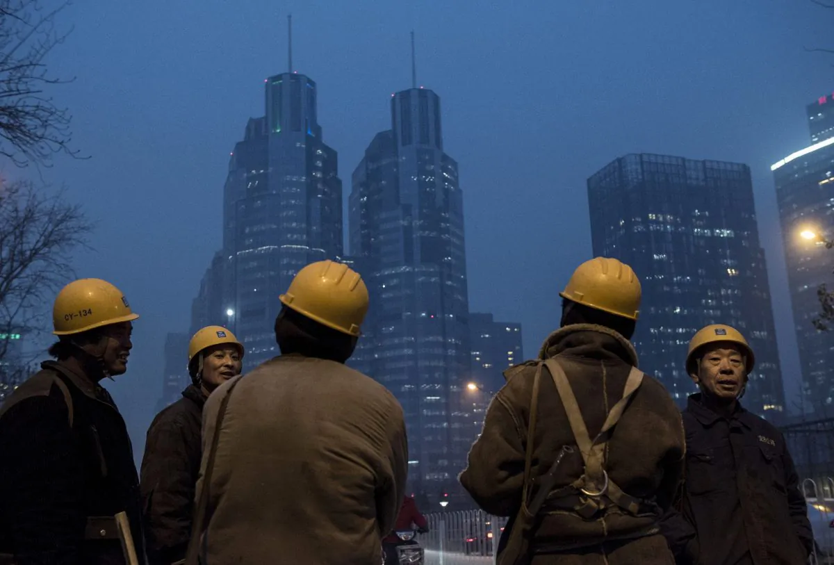 Chinese migrant workers at a construction site in Beijing, on Dec. 9, 2014. The constant inflow of workers from the countryside might have already turned around, according to several estimates. (Kevin Frayer/Getty Images)