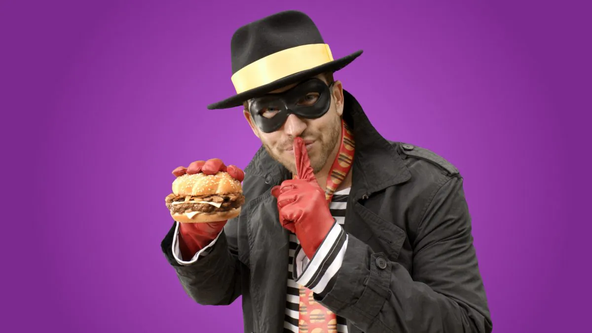 In this undated product image provided by McDonald’s one of the McDonald’s mascots the Hamburglar poses for a photo. The company is bringing the burger thief back to its advertising after a 13-year absence. On Wednesday, May 6, 2015, McDonald's Corp. tweeted a 30-second ad featuring the Hamburglar, his face unseen, flipping burgers in a suburban backyard with his wife and son. (McDonald’s via AP)