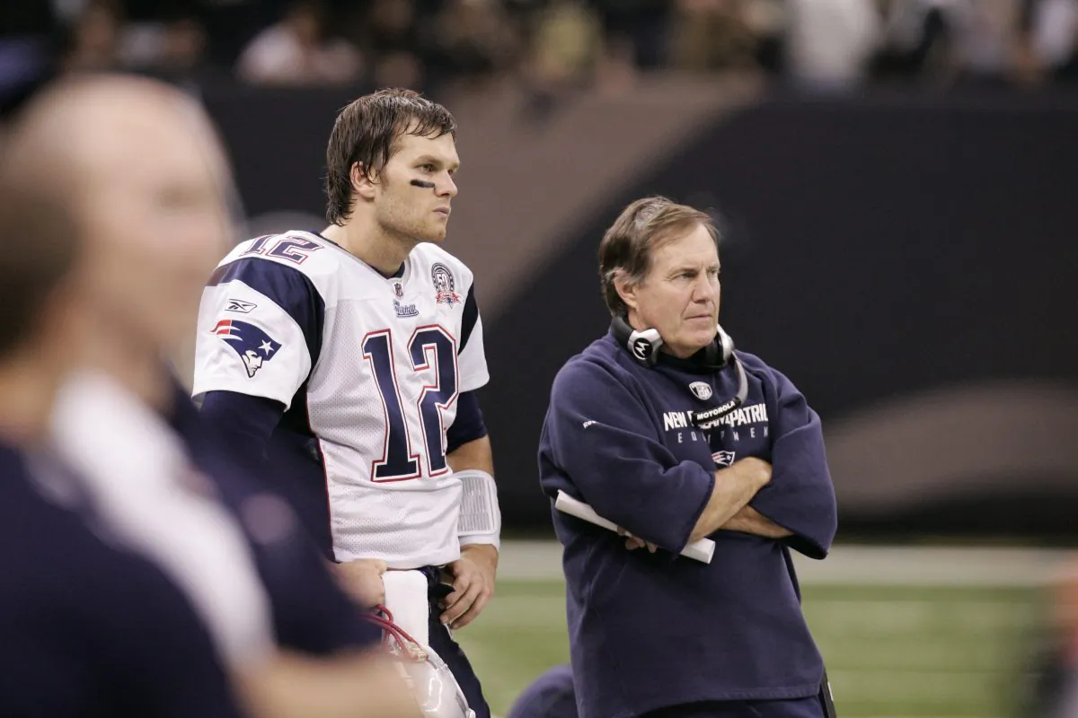 New England Patriots quarterback Tom Brady (L) and head coach Bill Belichick have been under fire over the years amid separate allegations of cheating. (Patrick Semansky/AP Photo) 