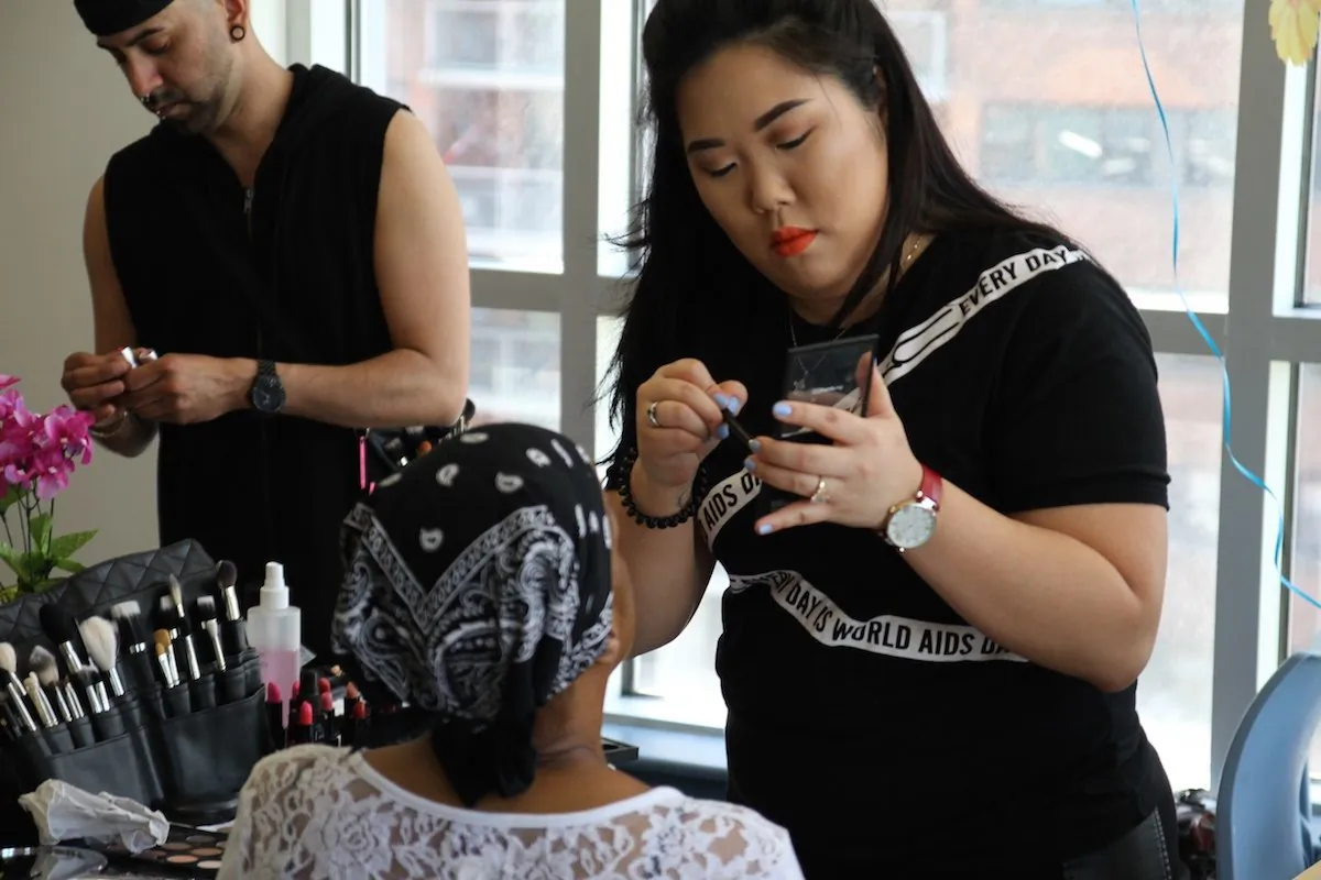 A MAC Cosmetics stylist applies make-up to a formerly incarcerated woman as part of an empowering make-over on May 7, 2015 in Harlem, New York. (Courtesy of The Fortune Society)