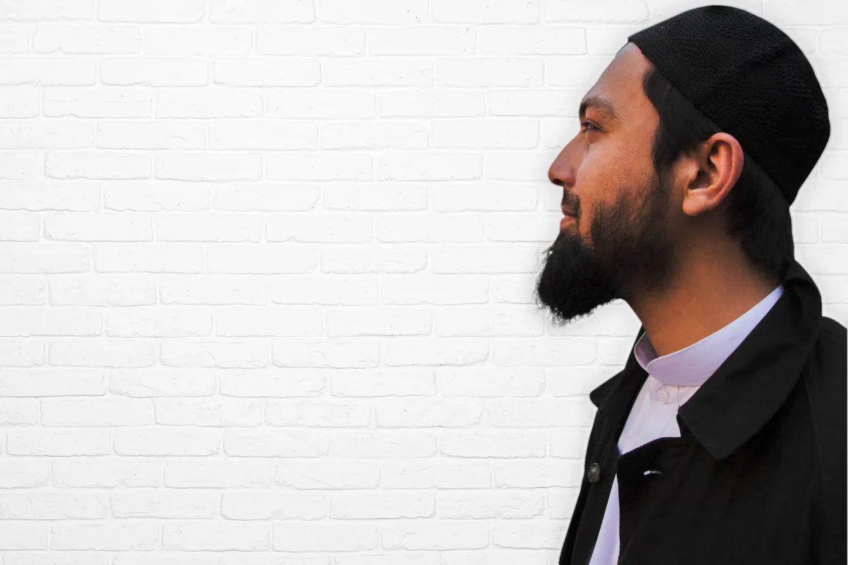 A’amash in New York City who is a business analyst for a major telecommunications company, could have considered joining an Islamic militant group if he had not had the right narrative to help him interpret the Qu’ran. (Photo of A’amash by Benjamin Chasteen/Epoch Times, background iStock photo)