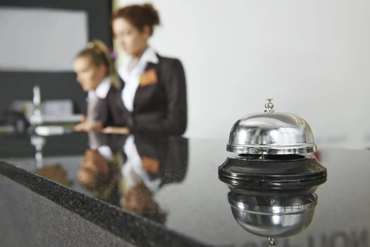 Hotel reception with bell (kadmy, iStock)