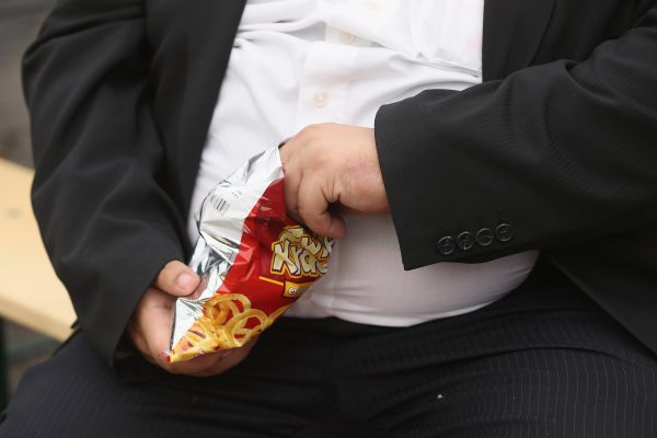 Heavyweight Man Eating Funk Food