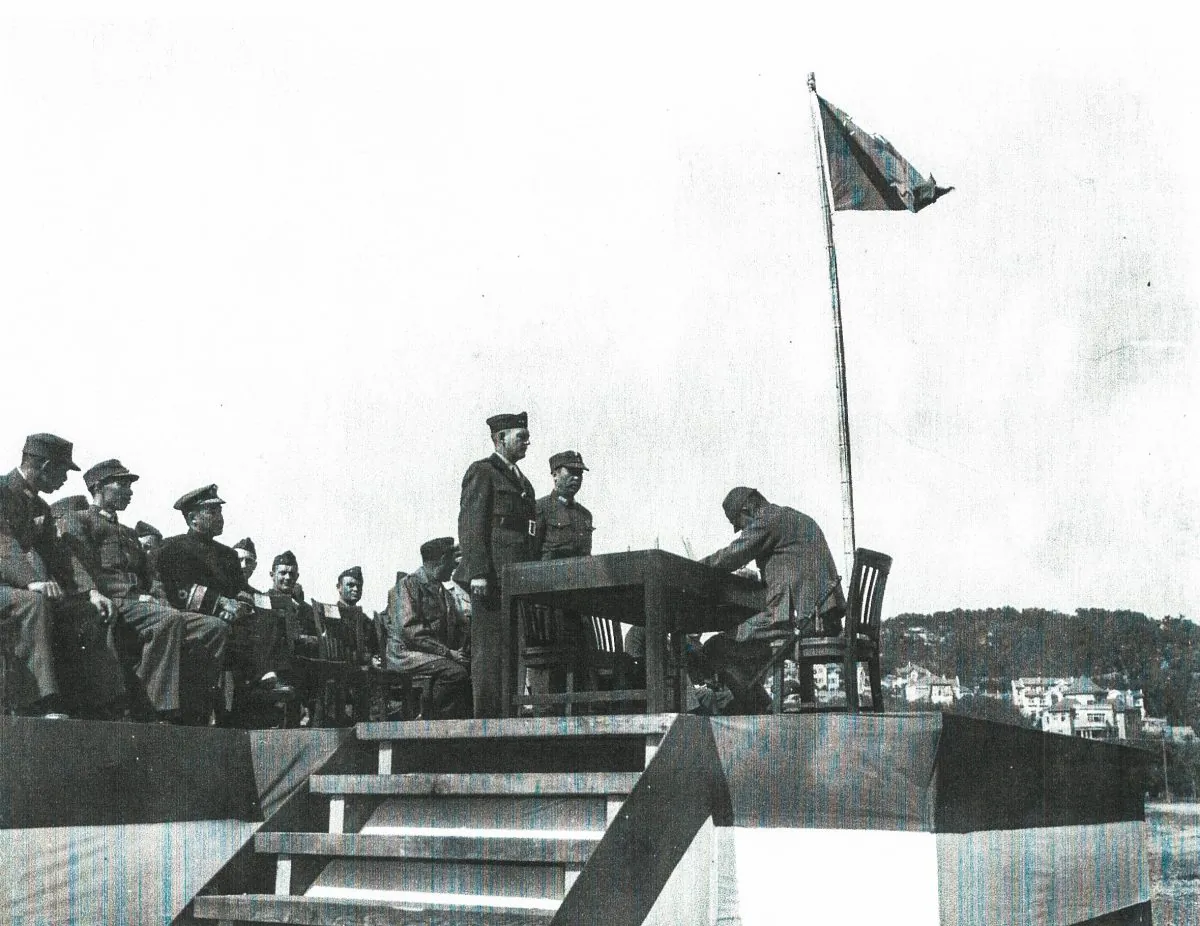 U.S. Marine Corps personnel represent Nationalist Chinese forces as Japanese officers sign surrender documents at the end of World War II in August 1945. (U.S. Marine Corps)