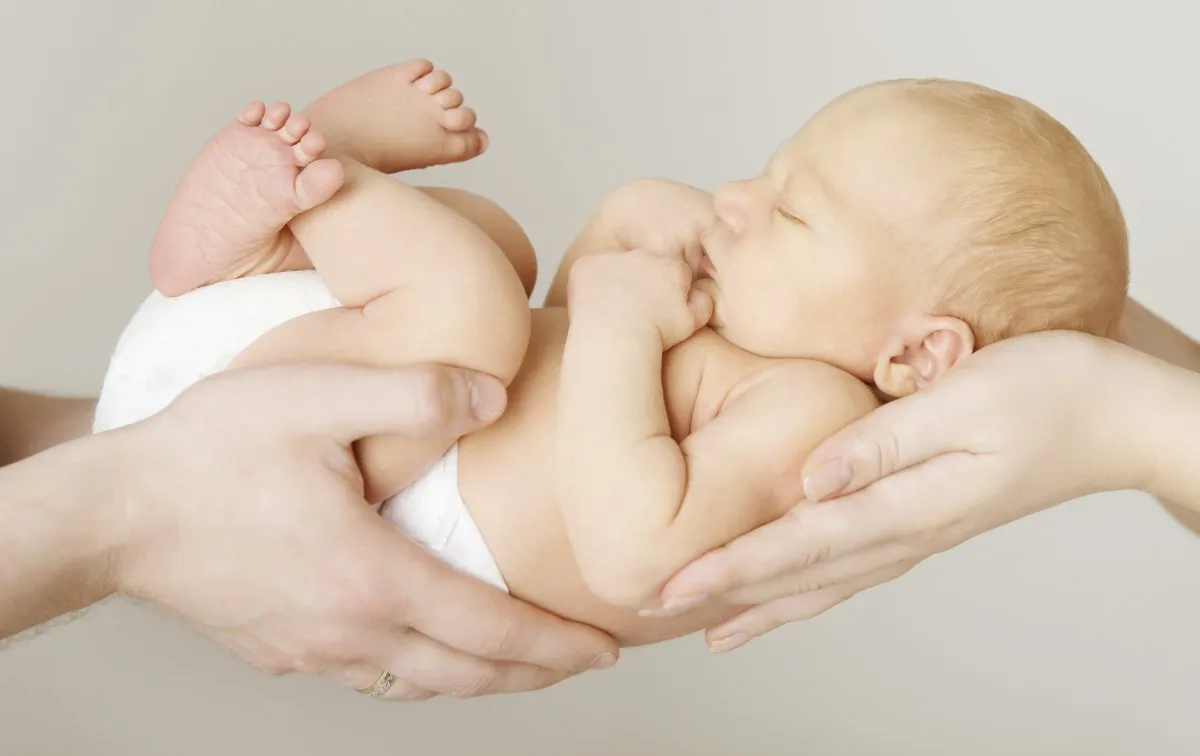 Even for couples who work full time, the burden of less fun forms of parenting, like changing diapers, often falls on the mother. (inarik/iStock)