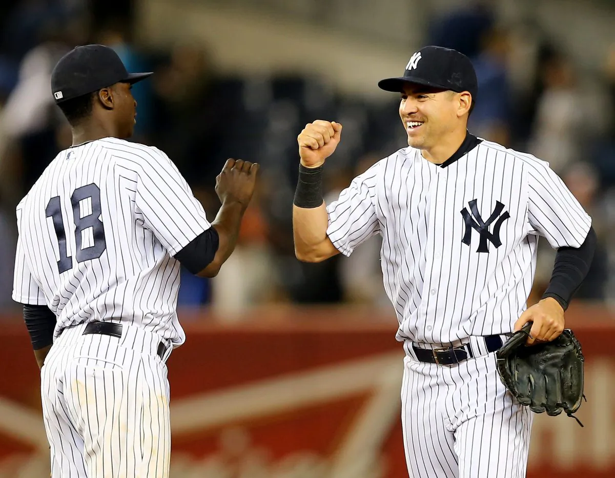 Didi Gregorius (L) and Jacoby Ellsbury have helped the New York Yankees defy the odds and move into first place. (Elsa/Getty Images) 