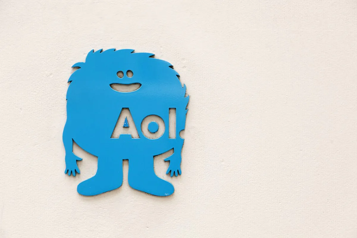 An AOL logo is posted outside the building where the company's headquarters is located, Tuesday, May 12, 2015 in New York. Verizon is buying AOL for about $4.4 billion, advancing the telecom's push in both mobile and advertising fields. (AP Photo/Mark Lennihan)