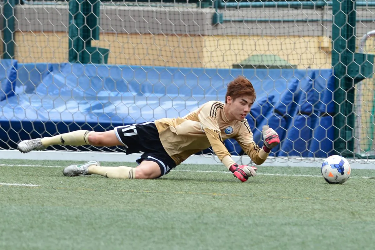 Sun Hei goalkeeper made some important saves, including this shot during their 3-2 defeat to Lucky Mile, at Sports Road on Sunday May 10, 2015. (Bill Cox/Epoch Times)
