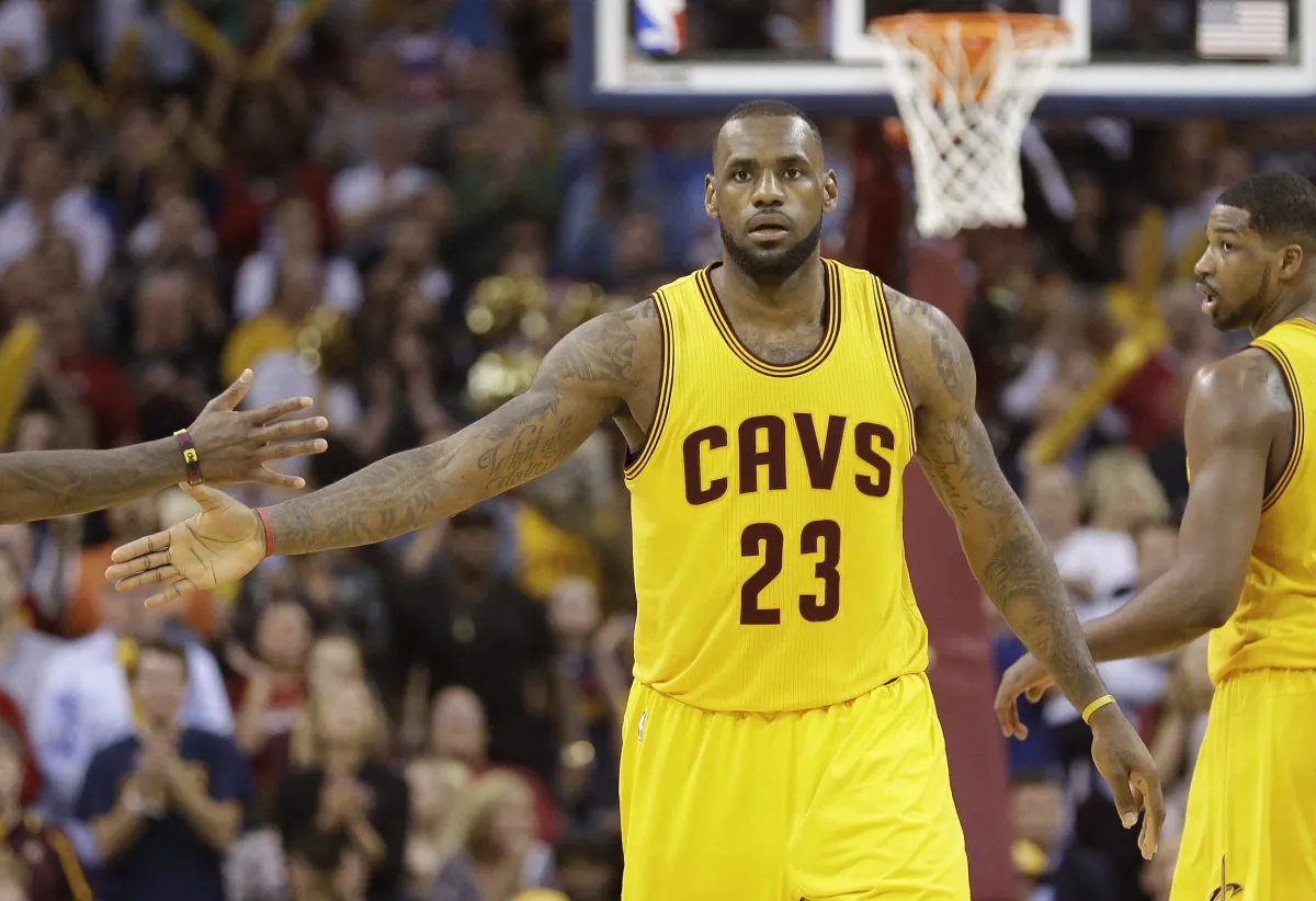 Cleveland Cavaliers forward LeBron James slaps scored 38 points in a Game 5 win over Chicago to put his team up three games to two. (AP Photo/Tony Dejak) 