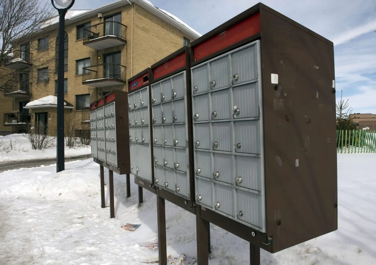 A community mailbox is seen in the east end of Montreal March 5, 2015. A survey of residents in communities that have lost home postal delivery shows respondents having problems accessing the new mailboxes due to snow, as well as incidents of slips and falls. (The Canadian Press/Ryan Remiorz)