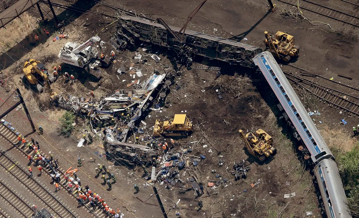 Investigators and first responders work near the wreckage of Amtrak Northeast Regional Train 188, from Washington to New York, that derailed on May 13, 2015, in north Philadelphia, Pennsylvania. (Win McNamee/Getty Images)