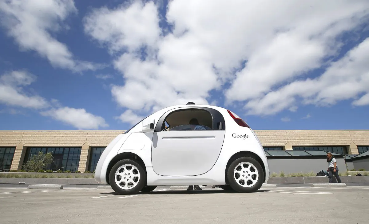 Google's new self-driving prototype car is presented during a demonstration at the Google campus in Mountain View, Calif. The car, which needs no gas pedal or steering wheel, will make its debut on public roads this summer. (AP/Tony Avelar)