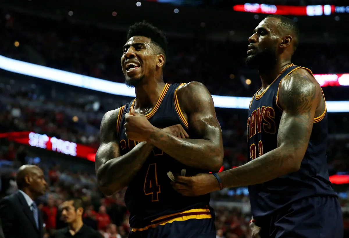 Iman Shumpert (L) and LeBron James have the Cleveland Cavaliers in the conference finals where they'll face the top-seeded Atlanta Hawks. (Jonathan Daniel/Getty Images) 