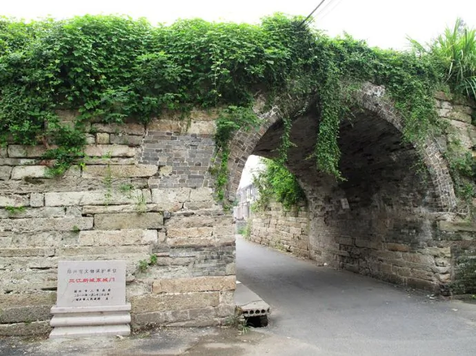 Sanjian Village's ancient East Gate, a four-meter high stone structure, in an undated photo. (Screen shot/people.cn)