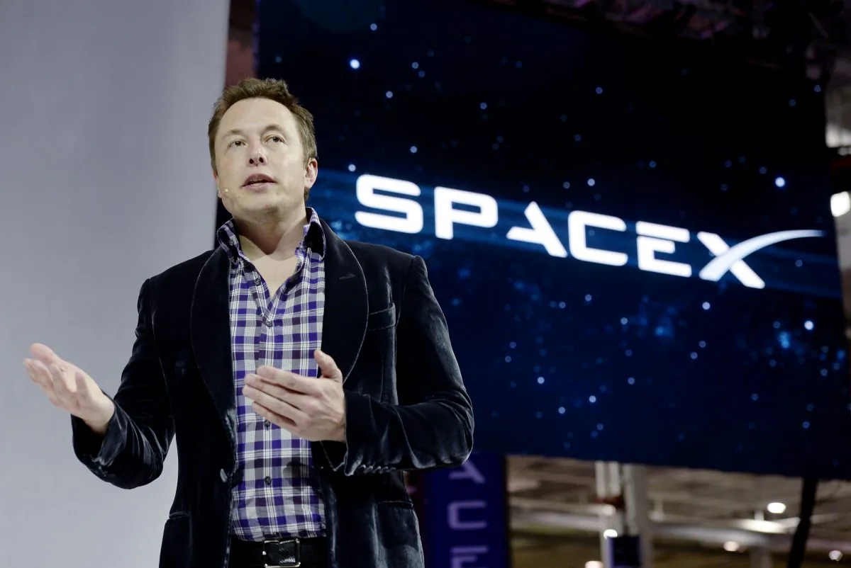 SpaceX CEO Elon Musk unveils the company's new manned spacecraft, The Dragon V2, designed to carry astronauts into space during a news conference on May 29, 2014, in Hawthorne, California. (Kevork Djansezian/Getty Images)