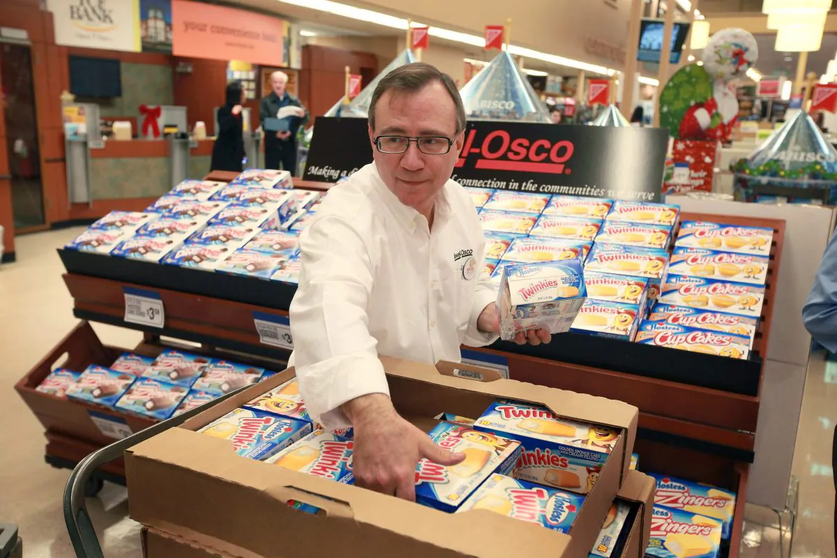 John Kolton stocks a display of Hostess snacks at a Jewel-Osco grocery store on December 11, 2012 in Chicago, Illinois. (Scott Olson/Getty Images)