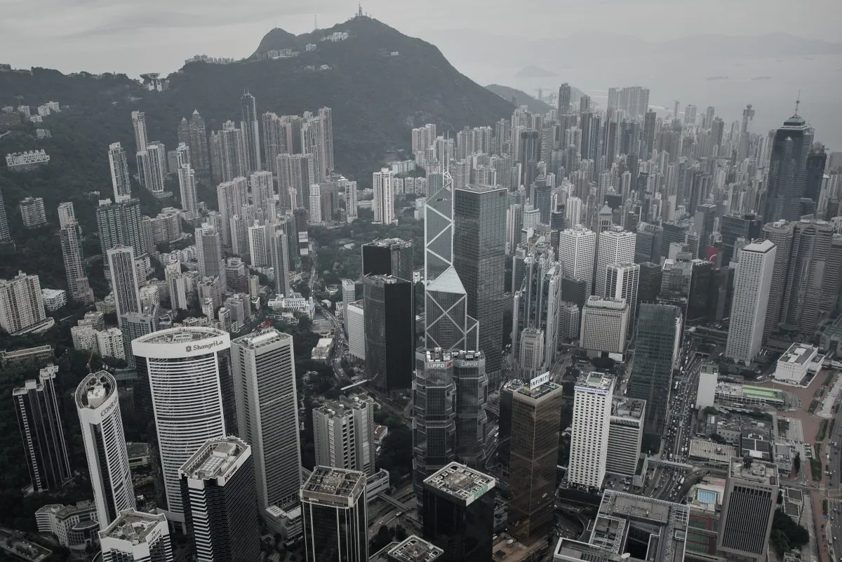 An aerial shot shows buildings in the Central district (Centre R) of Hong Kong and a section of the Peak (top L) on April 23, 2015. (Philippe Lopez/AFP/Getty Images)