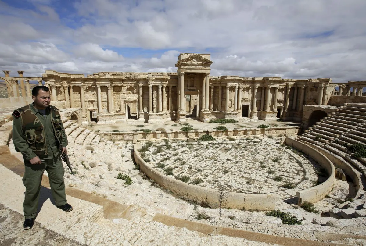 A picture taken on March 14, 2014 shows a Syrian policeman patrolling the ancient oasis city of Palmyra, 215 kilometres northeast of Damascus. (Joseph Eid/AFP/Getty Images)