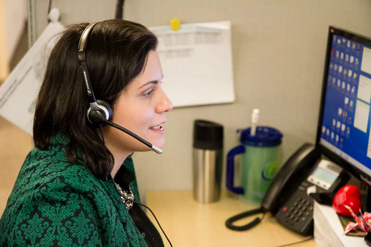 A hotline counselor takes calls in the office of the Mental Health Association of New York City on May 21, 2015.