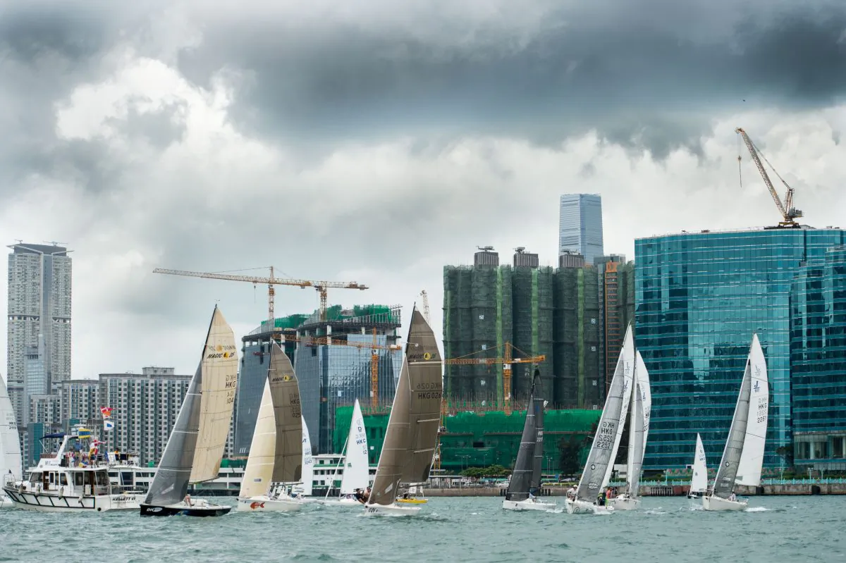 Sportsboats set off on Race-2 of the RHKYC Edmond de Rothschild Spring Regatta from Kowloon Bay on Sunday May 17, 2015.
(Ike Li/Prezzimages)