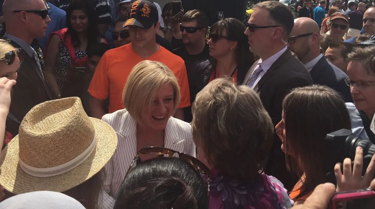 New Alberta Premier Rachel Notley (C) greets supporters at the Alberta Legislature Grounds on May 24, 2015, following the swearing-in ceremony of the new premier and her cabinet. (Omid Ghoreishi/Epoch Times)