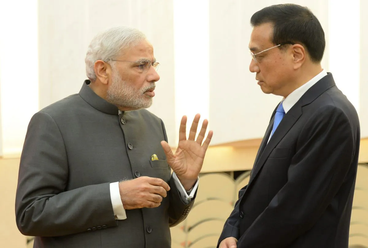 Indian Prime Minister Narendra Modi (L) talks with Chinese Premier Li Keqiang (R) after a press conference at the Great Hall of the People on May 15, in Beijing, China. Modi spoke more directly than Indian leaders often have when dealing with Beijing. (Kenzaburo Fukuhara - Pool/Getty Images) 
