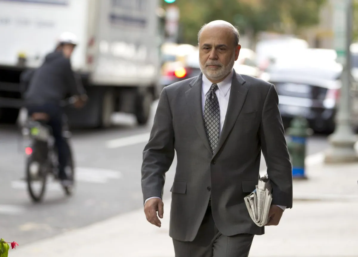 Former Federal Reserve Chairman Ben Bernanke arrives at the U.S. Court of Federal Claims in Washington on Oct. 9, 2014. ( AP Photo/Jose Luis Magana)