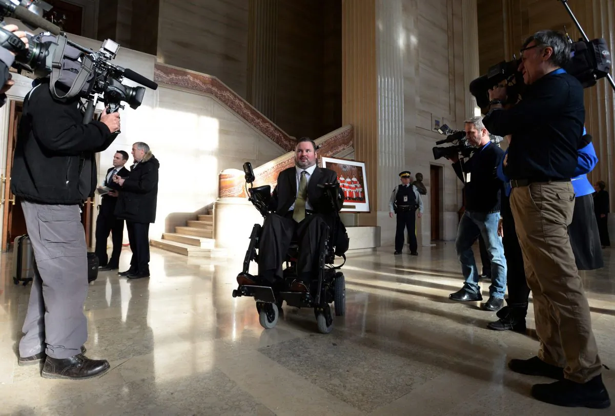 Conservative MP Steven Fletcher makes his way through the foyer of The Supreme Court of Canada in Ottawa on Friday morning, Feb. 6, 2015. The Supreme Court unanimously struck down the ban on providing a doctor-assisted death to mentally competent but suffering and "irremediable" patients. (The Canadian Press/Sean Kilpatrick)