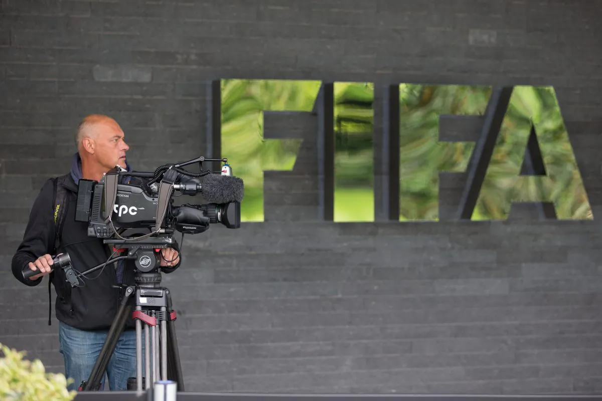 Preparing for scrutiny. Wednesday’s FIFA press conference gets ready to roll. (Philipp Schmidli/Getty Images)