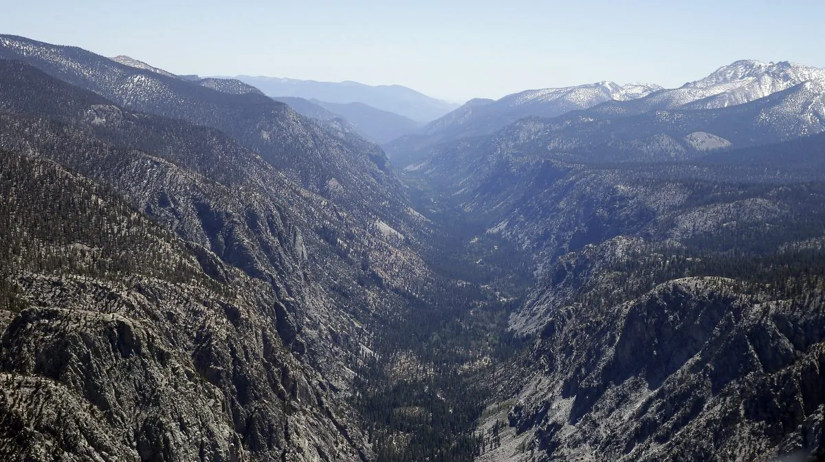 A valley in the Sequoia National Park normally covered in snow this time of year is seen during an aerial survey of the snowpack done by the Californian Department of Water Resources, Tuesday, April 28, 2015. (AP Photo/Rich Pedroncelli)