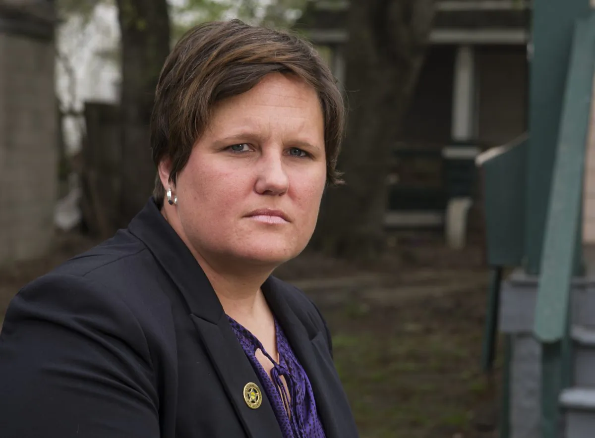 Stacey Fifer, a special agent for the Ohio Bureau of Criminal Investigation and a member of the Cuyahoga County Sexual Assault Task Force, stands in a south Cleveland neighborhood on Tuesday, May 5, 2015. (AP Photo/Phil Long)