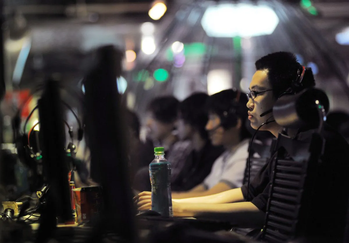 This photo taken on May 12, 2011 shows people at an internet cafe in Beijing. China. (Gou Yige/AFP/Getty Images)