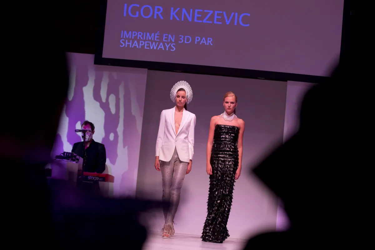
Models wear creations by Igor Knezevic 3-D printed by Shapeways at the 3D Print Show in Paris on Nov. 15, 2013. (Joel Saget/AFP/Getty Images) 