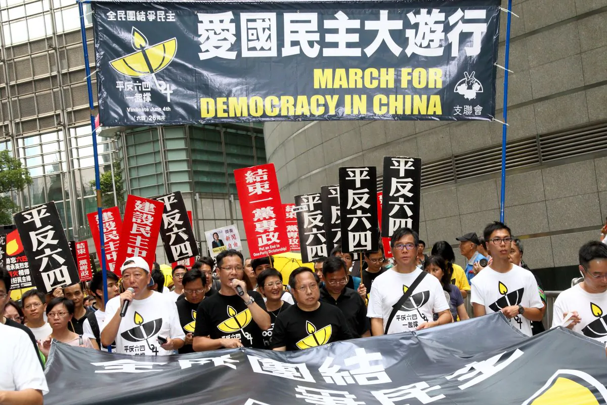 3,000 Hongkongers take to the street to commemorate the 26th anniversary of Tiananmen Square Massacre and to protest for democracy and human rights on May 31, 2015. (Epoch Times) 