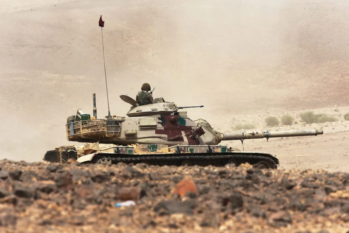 A tank participates in the final counter attack during joint military exercises by Jordan and 18 other nations including the U.S. as part of the annual Eager Lion on May 18, 2015 in the southeast desert of Wadi Shadiyah, Jordan. (Jordan Pix/ Getty Images)