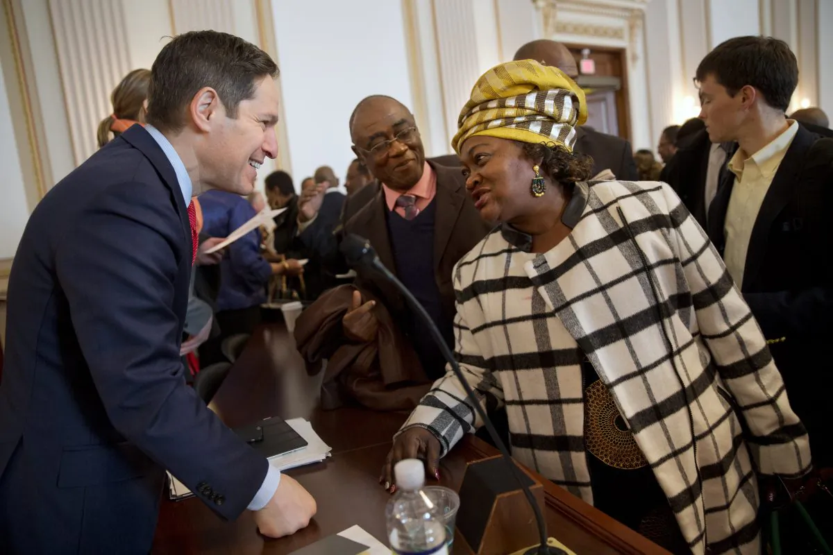 CDC head Tom Frieden, (L), and Nenebah Jalloh of Sierra Leone, on Capitol Hill in Washington on Jan. 13, 2015. (AP Photo/Jacquelyn Martin)