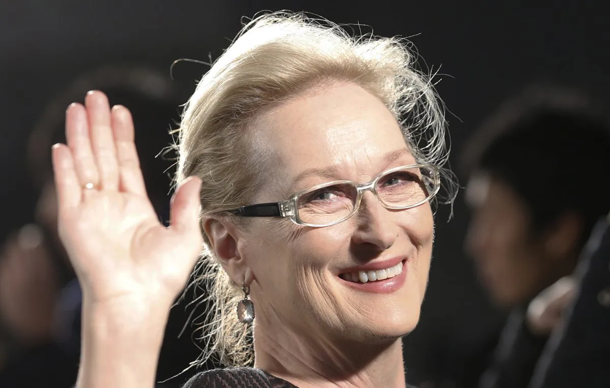 Meryl Streep waves to photographers during the Japan premiere of "Into the Woods" in Tokyo. (AP/Shizuo Kambayashi)