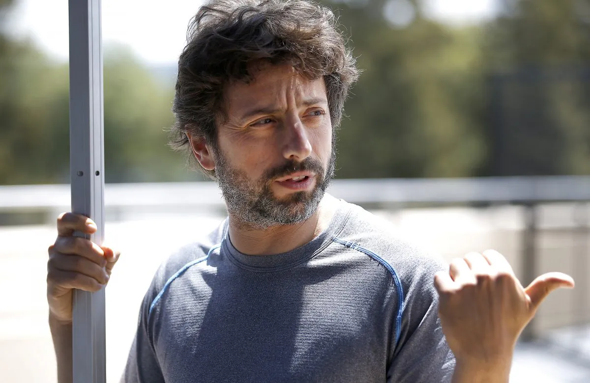 In this May 13, 2015 photo, Google co-founder Sergey Brin, speaks to reporters and guests about the new Google self-driving prototype car during a demonstration at the Google campus in Mountain View, Calif. (AP Photo/Tony Avelar)