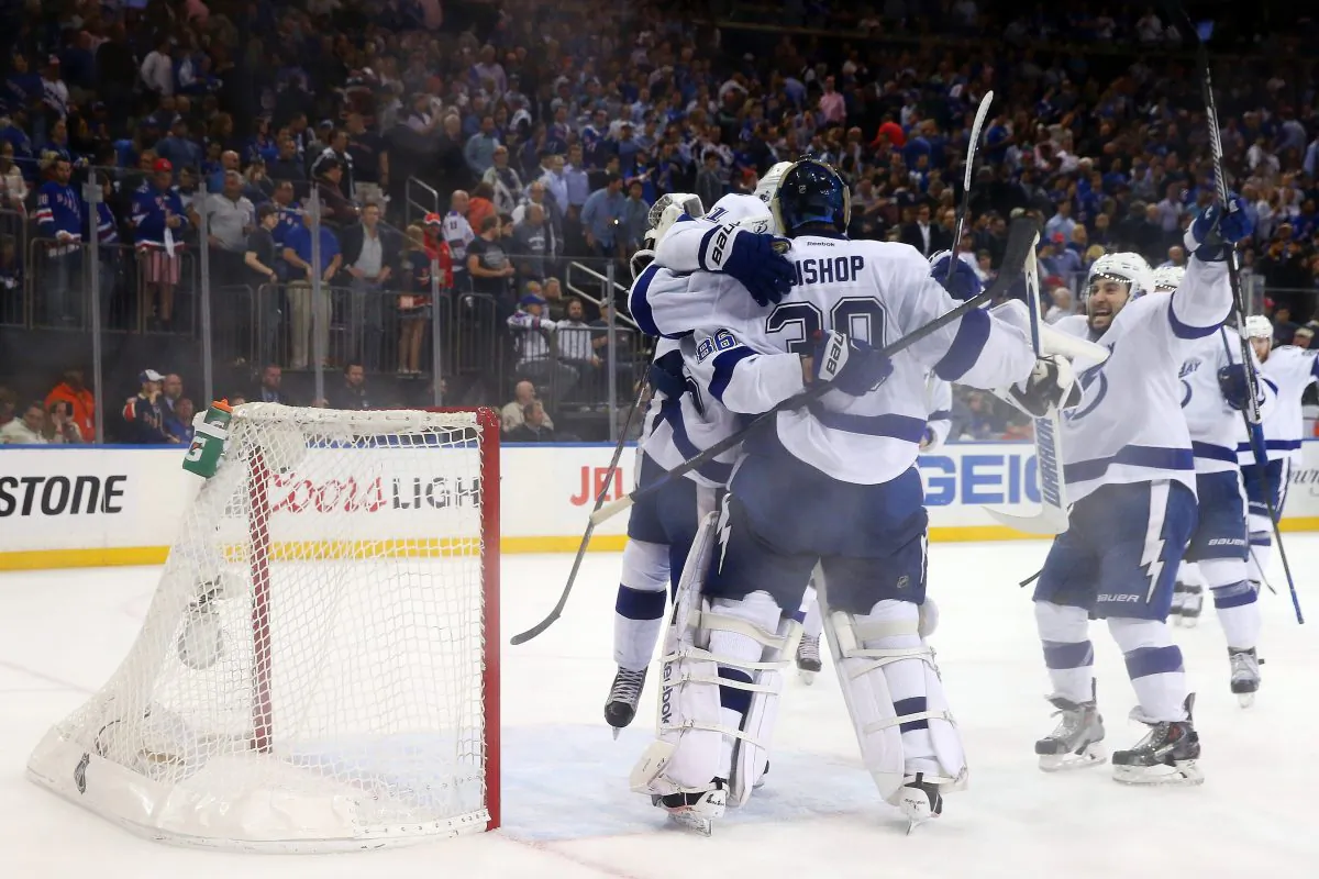 Ben Bishop of the Tampa Bay Lightning celebrates with his teammates after blanking the New York Rangers in Game 7 at Madison Square Garden on May 29, 2015 in New York City. The Lightning take on the Chicago Blackhawks in the Stanley Cup final. (Elsa/Getty Images)