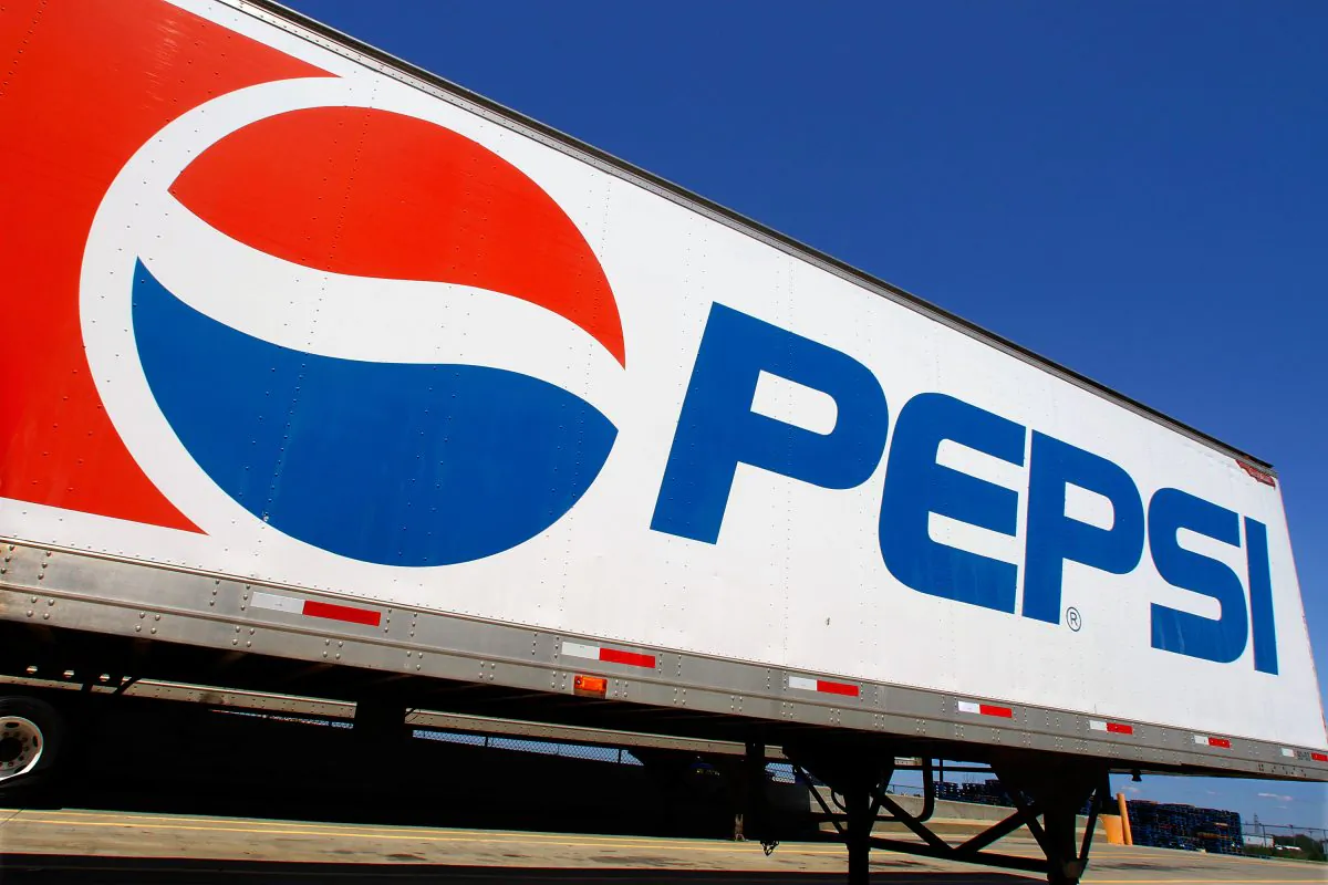 FILE - In this photo taken May 16, 2011, file photo, the Pepsi logo is seen on a delivery truck at Walmart in Springfield, Ill. (AP Photo/Seth Perlman, File)