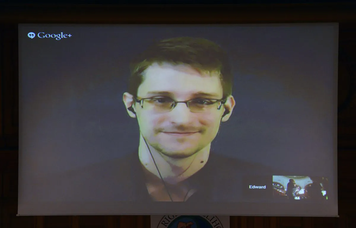 US National Security Agency (NSA) whistleblower Edward Snowden speaks via live video call during the Right Livelihood prize ceremony at the parliament in Stockholm, on December 1, 2014. (Jonathan Nackstrand/AFP/Getty Images)