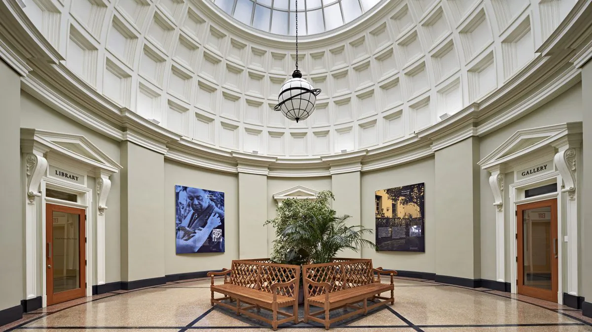 This 2015 photo provided by The New York Botanical Garden shows large-scale photographs of artist Frida Kahlo and the Casa Azul's garden in Mexico City on display at the "Frida Kahlo: Art, Garden, Life" exhibit at The New York Botanical Garden in Bronx, N.Y. (Robert Benson/The New York Botanical Garden via AP)