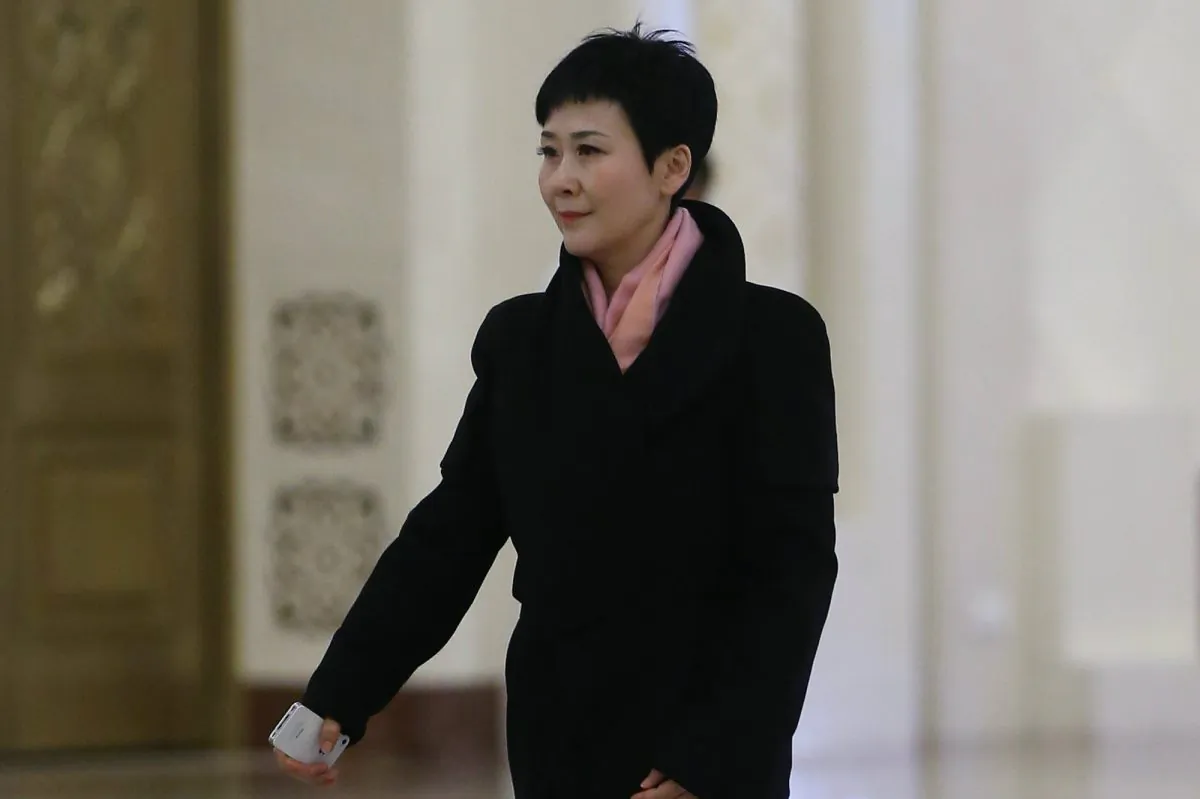 Li Xiaolin, former CEO of China Power International Development Ltd. and daughter of former Chinese Premier Li Peng, arrives at the Great Hall of the People on March 7, 2014 in Beijing, China. (Feng Li/Getty Images)