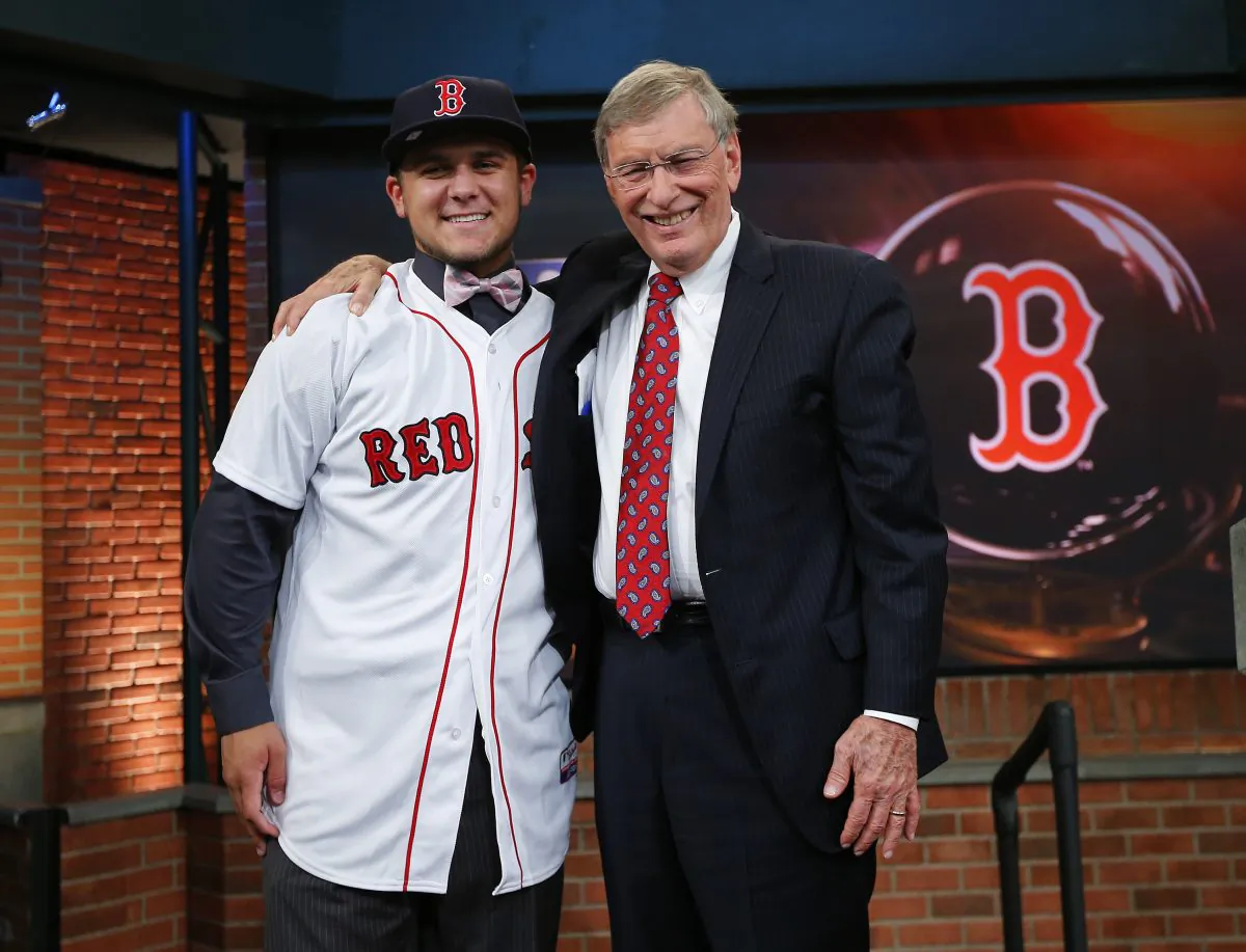 Michael Chavis (L) poses with former MLB Commissioner Allan H. Bud Selig after being chosen 26th overall by the Boston Red Sox during the 2014 MLB First-Year Player Draft. Chavis, an infielder is currently hitting .204 for Greenville—Boston's single-A team. (Rich Schultz/Getty Images) 