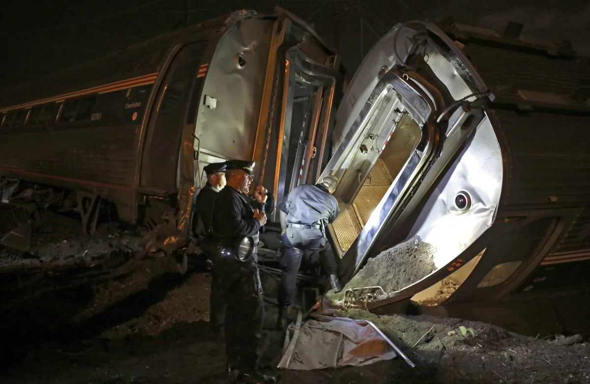 Emergency personnel work the scene of a train wreck in Philadelphia. (AP Photo/Joseph Kaczmarek)