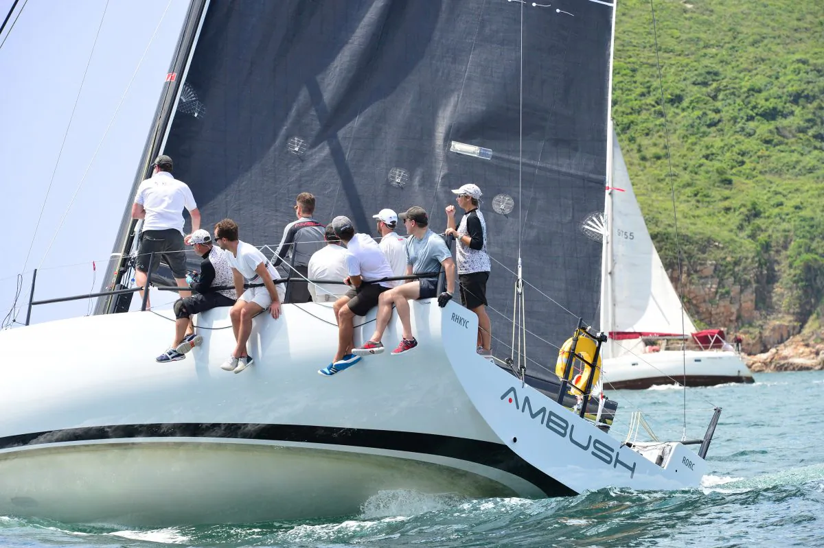 ‘Ambush’ heading for the finish off Little Palm Beach, to beat Line Honours winner ‘Zannekin’ on corrected time to take IRC Division-A win in Race-1 of the Hebe Haven Quest Yachting Typhoon Series 2015 on June 7, 2015. (Bill Cox/Epoch Times)