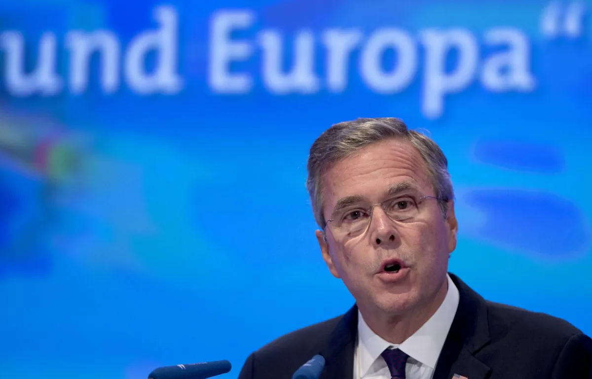 Former US Governor Jeb Bush speaks at the Economic Council in Berlin, Germany, Tuesday, June 9, 2015. The Economic Council is a German business association representing the interests of more than 11,000 small and medium sized firms, as well as larger multinational companies. Text in the background reads 'and Europe'. (AP/Michael Sohn)