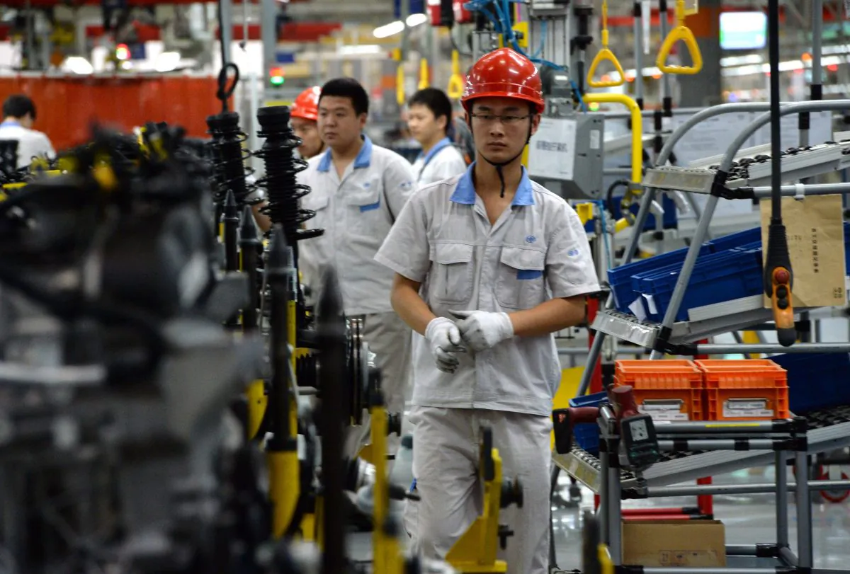 The assembly line at the FAW-Volkswagen plant in Chengdu, Sichuan province, on July 6, 2014.  China is attempting to build an advanced manufacturing base. (Goh Chai Hin/AFP/Getty Images)